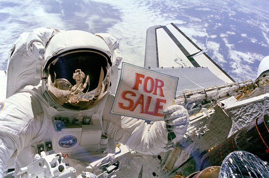 
An astronaut holding a 